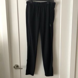 Reebok Speedwick Men’s Medium Black track pants with zippered pockets
